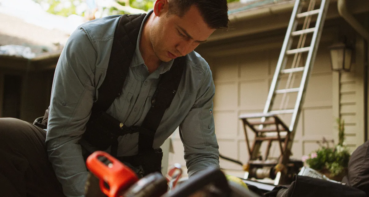 A service professional focused on a job.