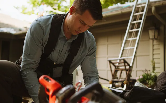 A service professional focused on a job.